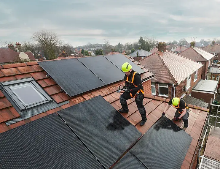 Solar PV systems being deployed on top of roof